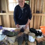Uncle Paul helping put together lavender bundles.