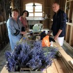 Aunt Donna and Uncle Paul helping Tara in putting together lavender bouquets.